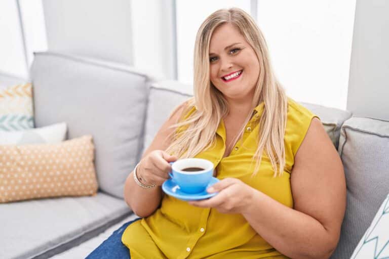 Young Woman Holding a Cup — MedSurg Weight Loss in Brisbane, QLD